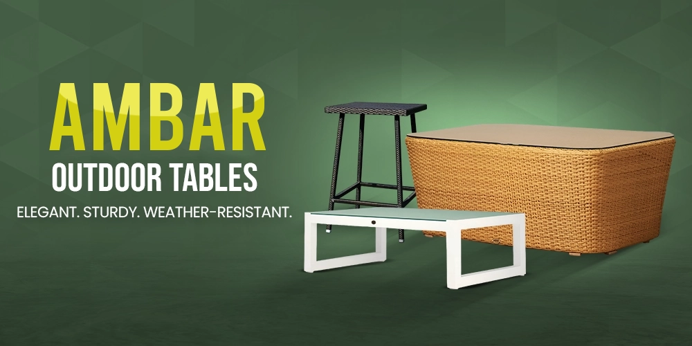 Amber outdoor tables set on a green background featuring a woven rattan coffee table, a low white bench table, and a tall black bar stool.